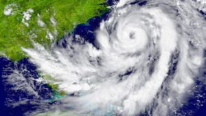 Satellite view of a hurricane forming over the Atlantic Ocean near the southeastern coast of the United States.