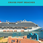 Cruise ship docked at Amber Cove with tourists walking by large sign, bright blue sky in the background.