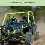 Two people drive a dune buggy on a dirt trail under the text "Cabo San Lucas Cruise Excursions.