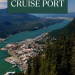 Aerial view of Juneau, Alaska cruise port with mountains and coastline.